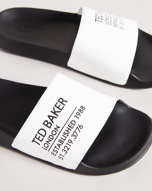 AZIELL-Sandals-Always be ready to hit the pool with AZIELL in your collection. In a classic slider style with Ted Baker branding across the top panel, these are a simple but stylish way to finish off your summer outfits. Sliders Ted Baker branded panel Open toe Slip on PU- Ted Baker Romania